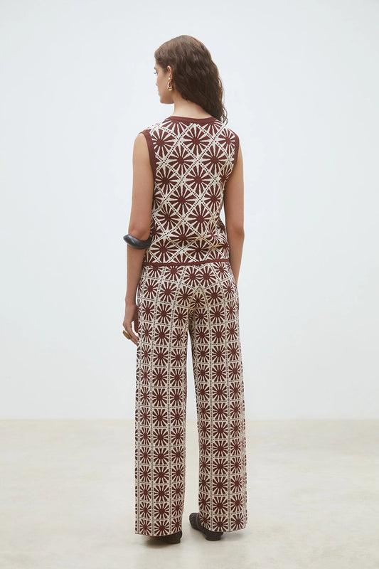 Suncoo - Ginea Vest
